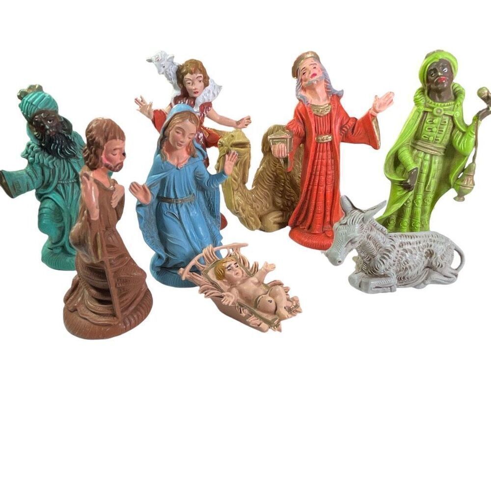 Vintage Italy hard plastic 9 piece Nativity scene.